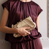 Isola: Gold Leather Handbag